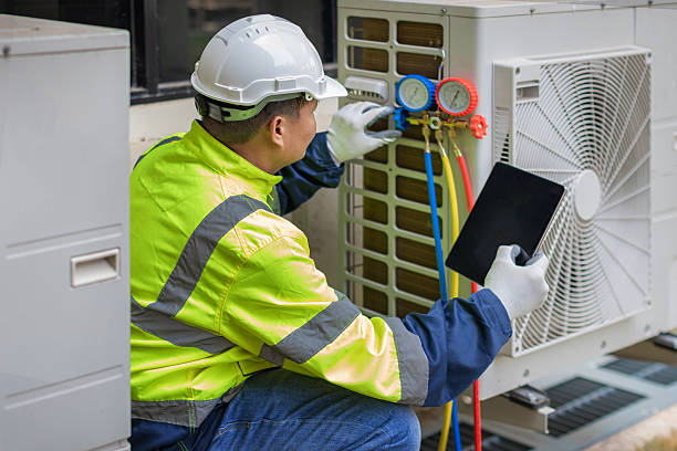 Professional Heat Pump Repair technician working in Atkins, AR